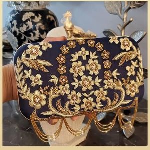 Fancy clutch. Deep blue color.